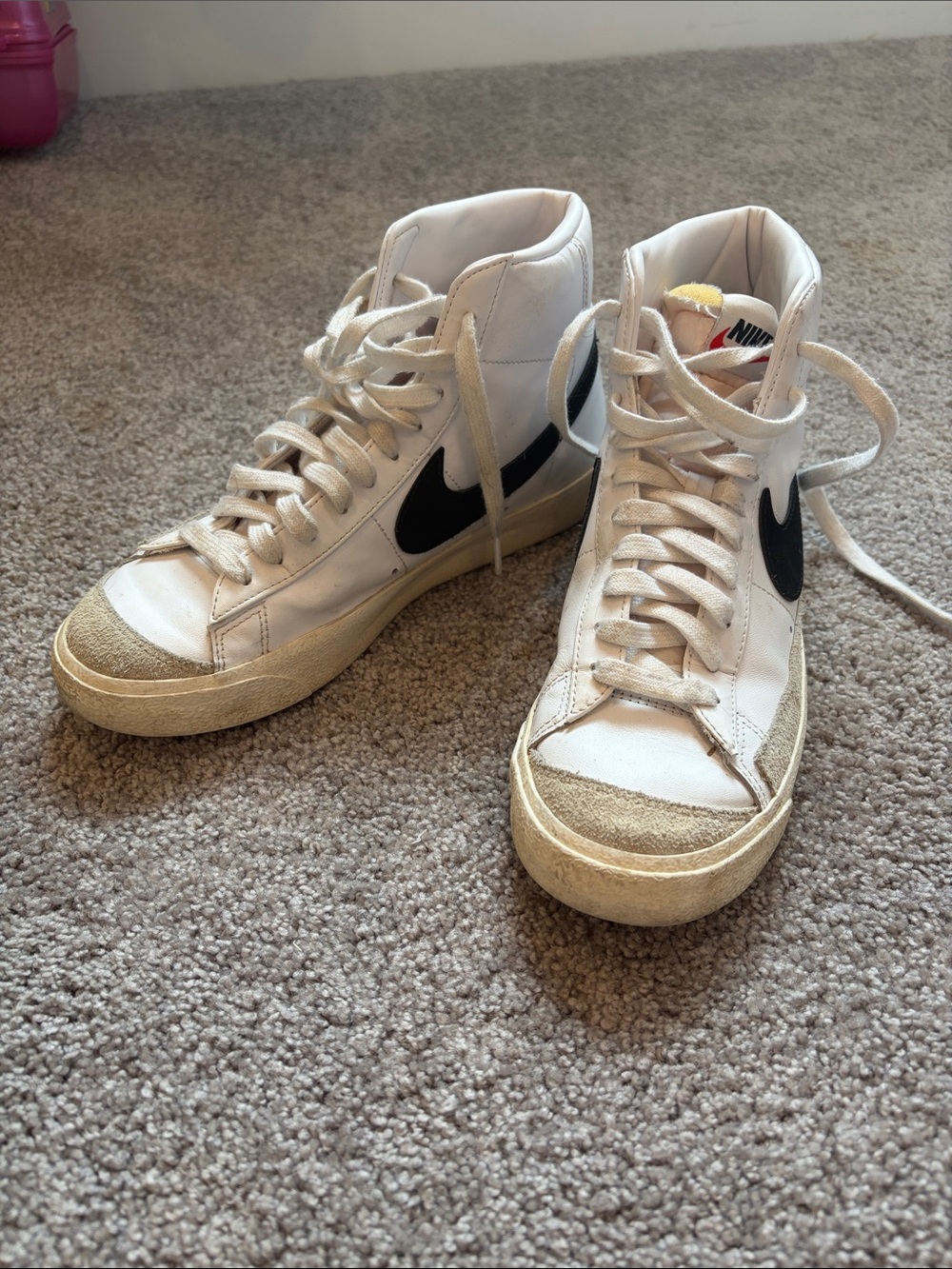Nike High-Top Sneakers in White with Black Swoosh